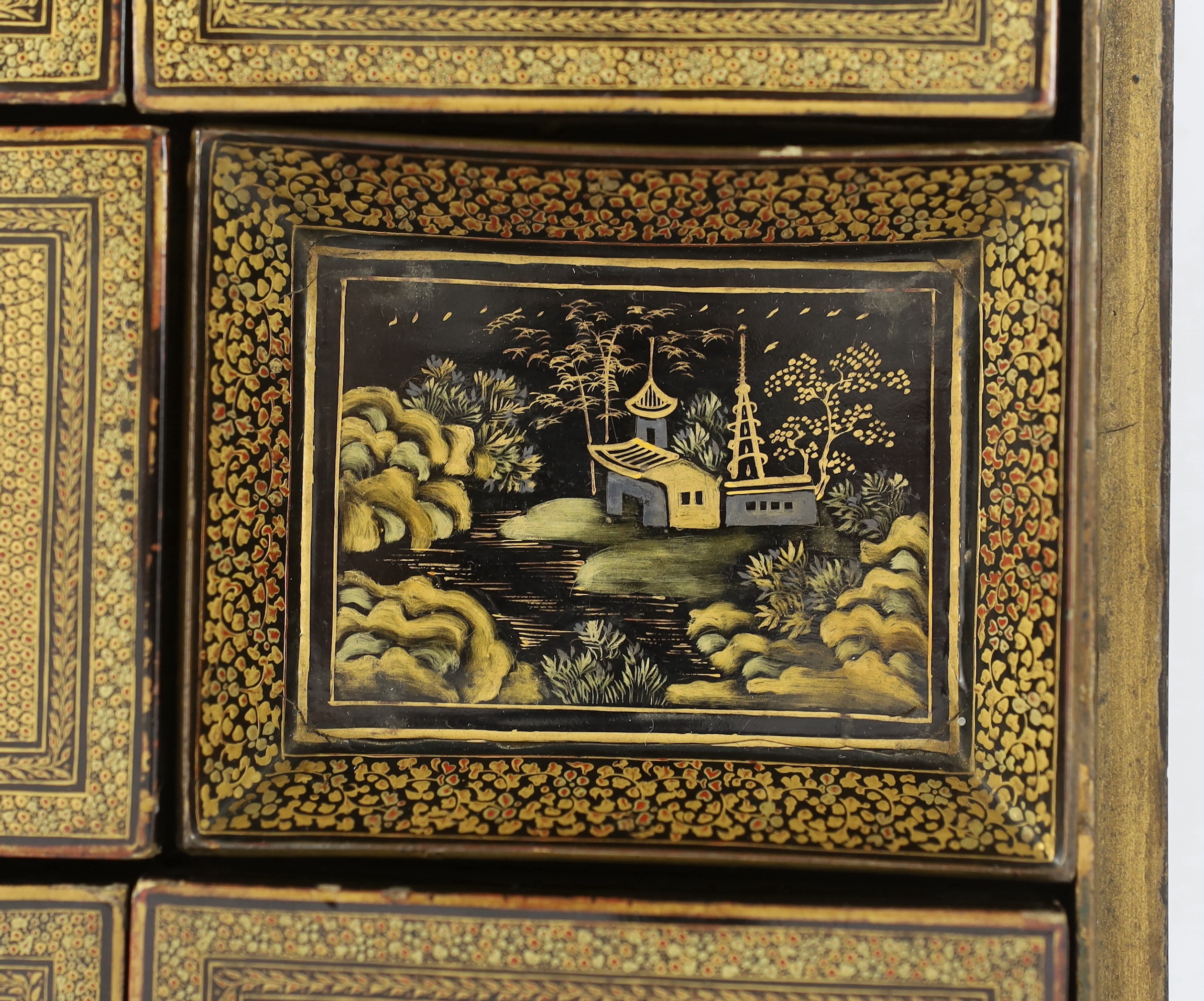 A Chinese gilt decorated black lacquer games box, mid 19th century, slight faults